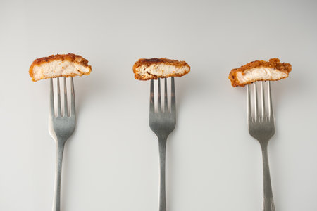 Golden Crispy Chicken Strips: A Tasty American Fast Food Favorite.の写真素材