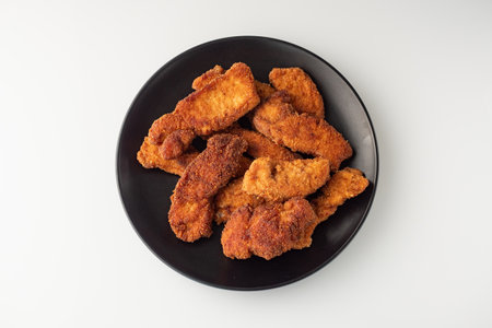 Golden Crispy Chicken Strips: A Tasty American Fast Food Favorite.の写真素材