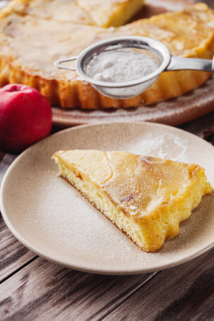Traditional Apple Pie Charlotte: Delicious and Homemade on a Rustic Wooden Table.の写真素材