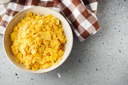 Crispy Corn Flakes with Milk Splash, Healthy Breakfast Cereal in Bowl, Morning Energy Meal.