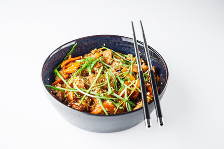 Wok Chicken with Funchoza and Vegetables, Asian Stir-Fry Delight, Tasty and Healthy Gourmet Dish.の写真素材