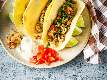 Delicious Spicy Mexican Tacos with Beef, Salsa, and Vegetables, Homemade Street Food, Healthy and Juicy Meal.の写真素材