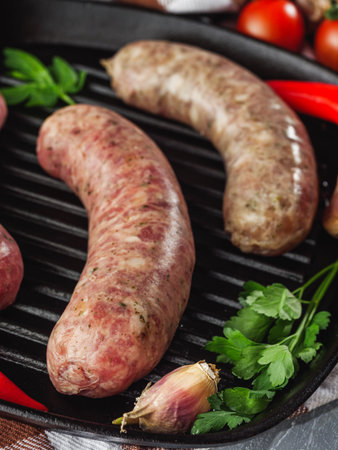 Raw and Grilled Sausage Gourmet BBQ Meat.の写真素材
