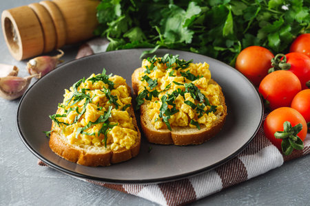 Scrambled Eggs on Toast: A Simple and Delicious Breakfast.の写真素材