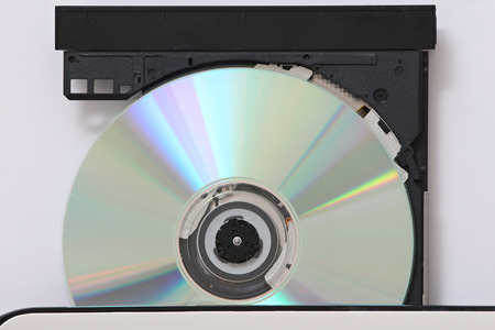 close-up on a cd dvd burner drive inside a laptopの写真素材