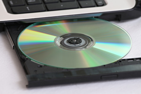 close-up on a cd dvd burner drive inside a laptop