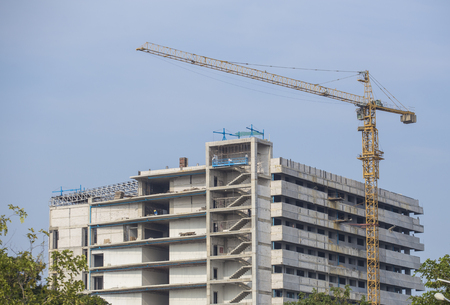 Construction site with cranes on sky backgroundのeditorial素材