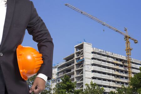 engineer orange helmet for workers security Construction  backgroundの写真素材