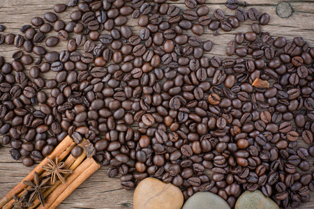 Coffee beans on wood backgroundの写真素材