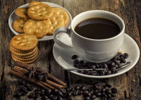 black coffee and coffee bean with biscuitsの写真素材