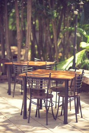 Relaxing garden chairs in garden vintage colorの写真素材