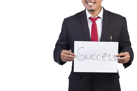 Businessman hold a sign. success overcoming problems and challenges and positive attitudeの写真素材