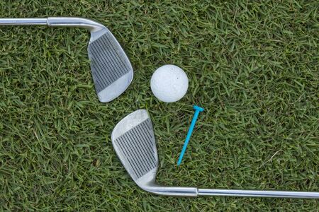 Golf Ball and Golf Club on grassの写真素材