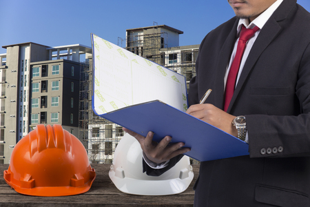 Business, Writing, Note Pad on Construction backgroundの写真素材