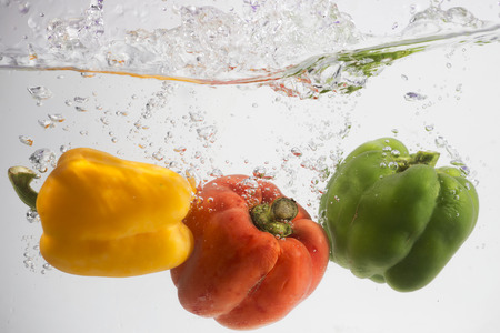 vegetables splash waterの写真素材