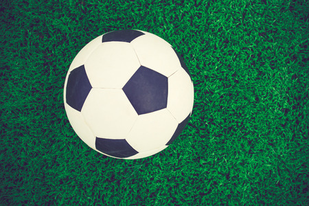 soccer ball on soccer field vintage colorの写真素材