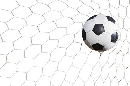 soccer ball in goal on white backgroundの写真素材