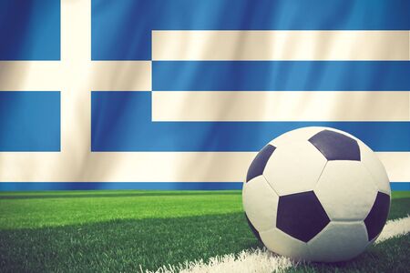 Soccer ball on Greek grunge flag vintage colorの写真素材