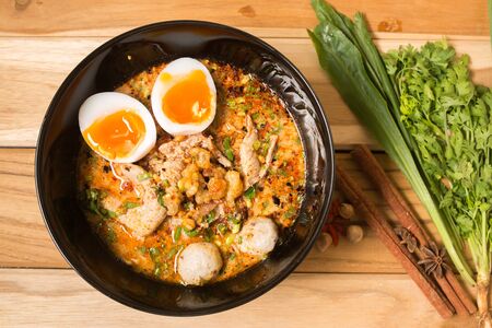 Thai noodle soup in a bowl taste spicy noodle soup and boiled egg