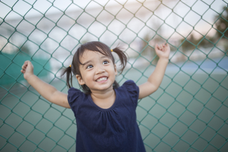 Portrait of a beautiful liitle girl close-up. Soft colors edition.Soft focus.の写真素材