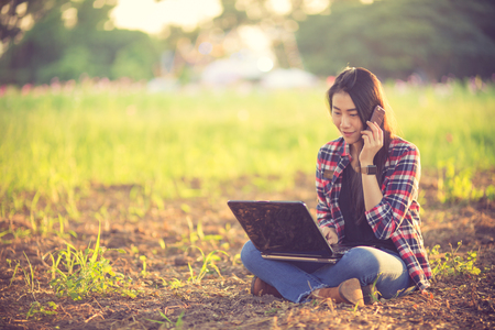 Woman with computer shopping onlineの写真素材