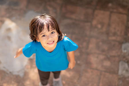 Active little girl on playgroundの写真素材