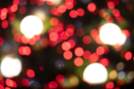 blurred Chrismas background with street lights on the night street