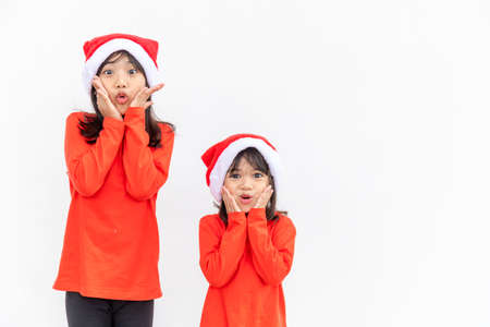 Merry Christmas. Children cheerful celebrate Christmas.  Siblings are ready to celebrate Christmas or meet new year.の写真素材