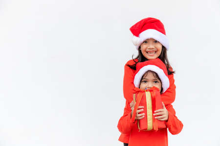 Merry Christmas. Children cheerful celebrate Christmas.  Siblings are ready to celebrate Christmas or meet new year.の写真素材