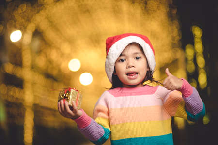 Happy children with Christmas giftの写真素材