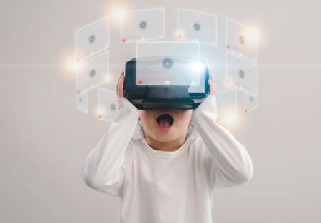 happy girl in glasses of virtual reality. Augmented reality, science, future technology concept. VR....
