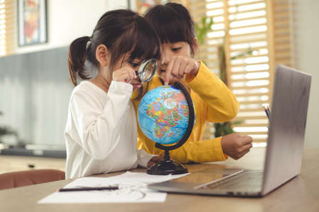 Asian girl student online learning class study online video call zoom teacher, Happy girl learn...