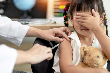 vaccination of children. An injection. Selective focus.の写真素材