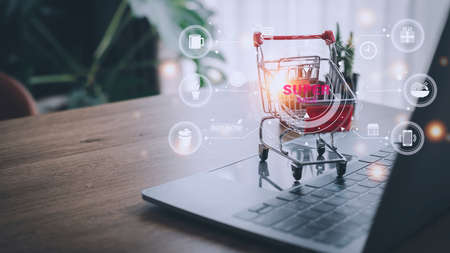 Shopping cart with shopping icons,online shopping conceptsの写真素材