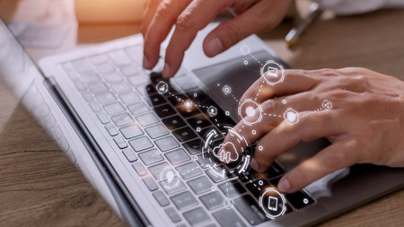 businessman working on his laptop in the office, select the icon cloud on the virtual display. Concept digital technology and cloud technologyの写真素材