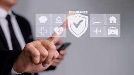 insurance concept on virtual blue screen with iconsの写真素材