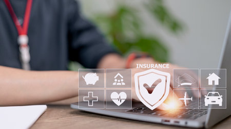 insurance concept on virtual blue screen with icons