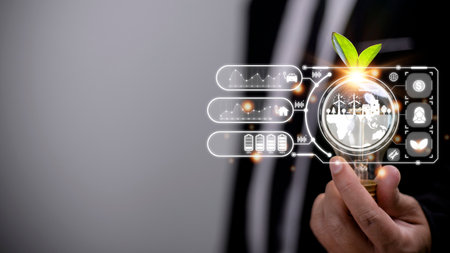 Businesswoman hand holding light bulb with esg icon on virtual screen, ESG Environmental, social and...