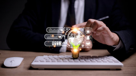 Businesswoman hand holding light bulb with esg icon on virtual screen, ESG Environmental, social and corporate governance conceptの写真素材