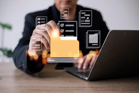 Uploading documents from folder. Open File folder with flying blank documents. Data transfer backup, File Sharing, Document Transferring conceptの写真素材