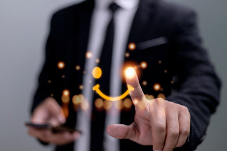 The consumer answered the survey in a conceptual way. Customer creates a happy face smiling symbol using a digital pen. The notion of customer happiness and service experience.の写真素材