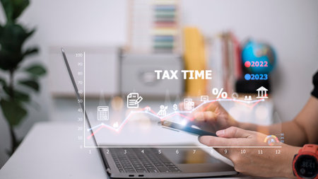 Concept of tax payment optimization business finance, people with taxes icon on technology screen,...