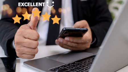 customer hand  with gold five star rating feedback icon and press level excellent rank for giving...