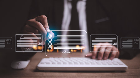 Paperless workplace ideas, e-signing, electronic signature, document management. A businessman signs an electronic document on a digital document on a virtual screen using a stylus pen.の写真素材
