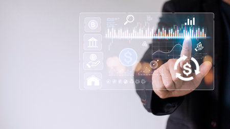 Finance trade manager analysing stock market indicators for best investment strategy, financial data and chartsの写真素材