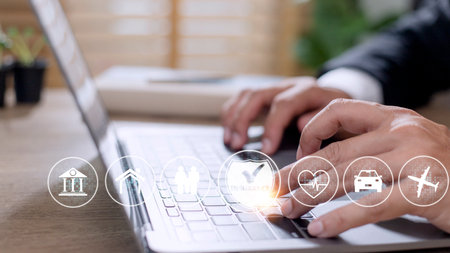 Online insurance on virtual screen. Life, car, property, health and family. Internet and digital technology concept.の写真素材