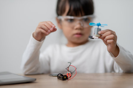 Asia students learn at home in coding robot cars and electronic board cables in STEM, STEAM,...