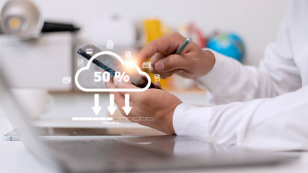 Cloud storage technology concept. Businessmen use laptops to synchronize documents or data to online...