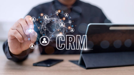 CRM Customer Relationship Management for business sales marketing system concept presented in futuristic graphic interface of service application to support CRM database analysis.の写真素材