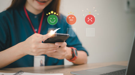 smart woman use smartphone choosing green happy smile face icon. feedback rating and positive customer review experience, satisfaction survey. mental health assessment. world mental health day conceptの写真素材